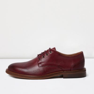 Red leather lace up shoes